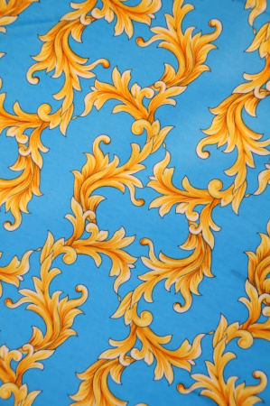 Трикотаж  ЗОЛОТЫЕ ЗАВИТКИ на голубом фоне 2