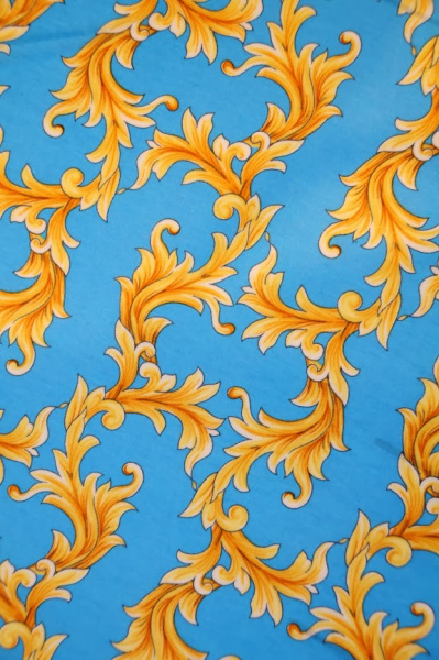 Трикотаж  ЗОЛОТЫЕ ЗАВИТКИ на голубом фоне 2