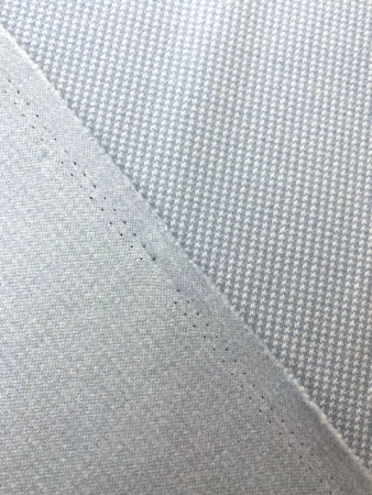 Трикотаж МЕЛКАЯ ГУСИНАЯ ЛАПКА серо-голубая полотно