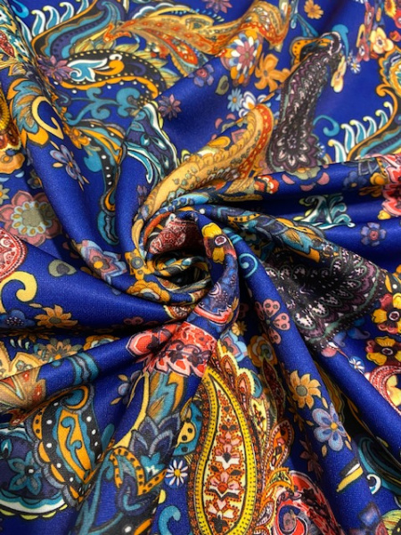 Трикотаж водолаз ЯРКИЙ ПЕЙСЛИ синий трикотажная ткань